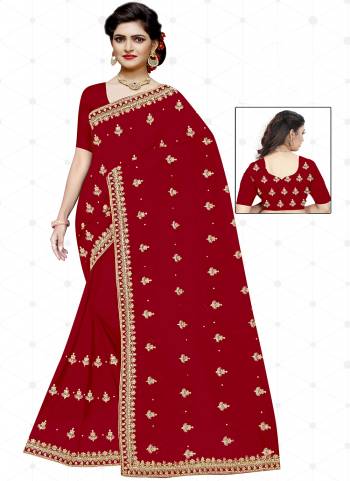 Garb These Wedding Wear Saree in Fine Red Colored.These Saree And Blouse is Fabricated On Heavy Georgette.Its Beautified With Heavy Jari Embroidery With Diamond Work.