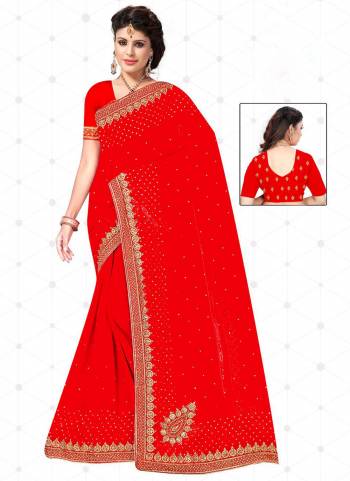 Garb These Wedding Wear Saree in Fine Red Colored.These Saree And Blouse is Fabricated On Heavy Georgette.Its Beautified With Heavy Jari Embroidery With Diamond Work.