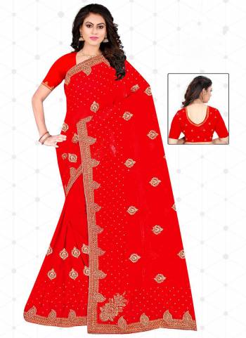 Garb These Wedding Wear Saree in Fine Red Colored.These Saree And Blouse is Fabricated On Heavy Georgette.Its Beautified With Heavy Jari Embroidery With Diamond Work.