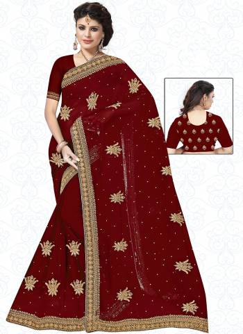 Garb These Wedding Wear Saree in Fine Red Colored.These Saree And Blouse is Fabricated On Heavy Georgette.Its Beautified With Heavy Jari Embroidery With Diamond Work.