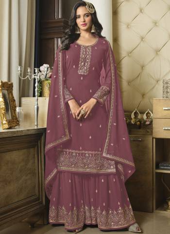 Attrective These Sharara Suit in Fine Colored Pair With Bottom And Dupatta.These Top And Dupatta Are Faux Georgette And Pair With Faux Georgette Bottom.Its Beautified With Santoon Inner.Its Beautified With Heavy Designer Embroidery Work.