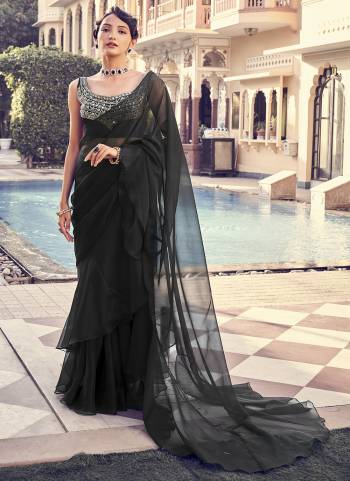 Looking These Party Wear Designer Saree in Fine Colored.These Saree Are Organza And Blouse is Fabricated On Georgette.Its Beautified With Designer Embroidery Work.