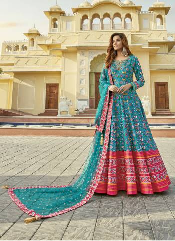 For A Designer Look,Grab These Readymade Gown With Dupatta in Fine Colored.These Gown Are Fabricated On Cherry Silk Pair With Net Dupatta.Its Beautified With Designer Patola Printed With Embroidery Work.