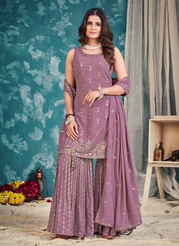 Attrective These Readymade Sharara Suit in Fine Colored Pair With Bottom And Dupatta.These Top Are Georgette And Dupatta Are Fabricated On Georgette Pair With Georgette Bottom.Its Beautified With Heavy Designer Sequance,Thread Embroidery Work.