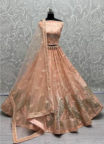 For A Designer Look,Grab These Lehenga Choli With Dupatta in Fine Colored.These Lehenga And Choli Are Bridal Net And Dupatta Are Fabricated On Soft Net Pair.Its Beautified With Designer Fancy Multy Thread,Sequance Embroidery Work.