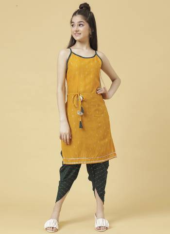 Grab These Beautiful Looking Kids Readymade Kurti With Dhoti.These Kurti Are Poly Cotton And Dhoti is Ruby Cotton Fabricated.Its Beautified With Designer Foil Printed.