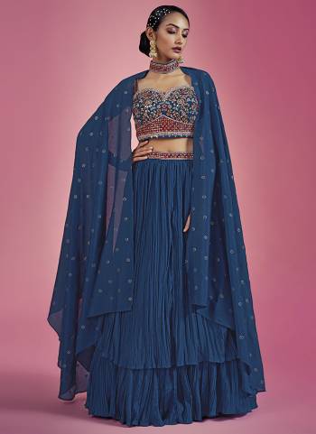 For A Designer Look,Grab These Readymade Lehenga Choli in Fine Colored.These Lehenga And Blouse Are Fabricated On Chinon Pair With Chinon Dupatta.Its Beautified With Designer Heavy Embroidery Work.