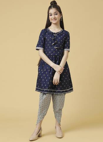 Grab These Beautiful Looking Kids Readymade Kurti With Dhoti.These Kurti Are Poly Cotton And Dhoti is Ruby Cotton Fabricated.Its Beautified With Designer Foil Printed.