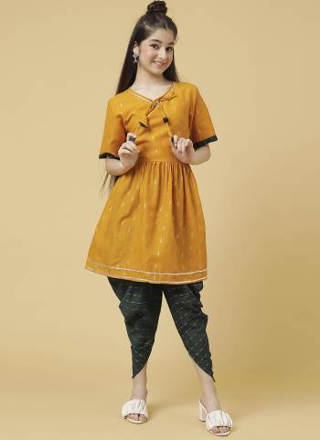 Grab These Beautiful Looking Kids Readymade Kurti With Dhoti.These Kurti Are Poly Cotton And Dhoti is Ruby Cotton Fabricated.Its Beautified With Designer Foil Printed.