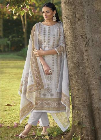 Grab These Summer Collection Suit in Fine Colored Pair With Bottom And Dupatta.These Top And Dupatta Are Fabricated On Cotton Pair With Cotton Bottom.Its Beautified With Digital Printed With Foil Work.