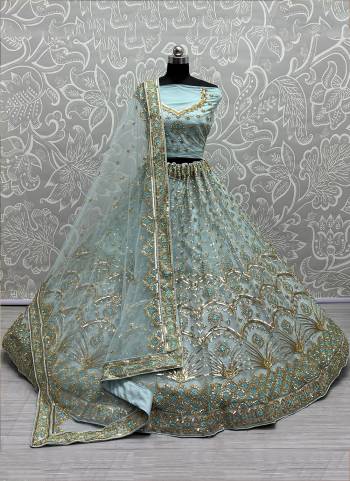 For A Designer Look,Grab These Lehenga Choli With Dupatta in Fine Colored.These Lehenga And Choli Are Bridal Net And Dupatta Are Fabricated On Soft Net Pair.Its Beautified With Designer Fancy Multy Thread,Sequance Embroidery With Hand Work.