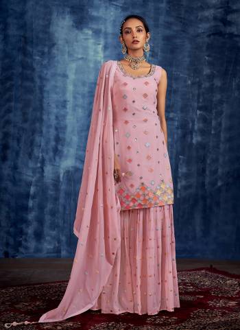 Attrective These Readymade Sharara Suit in Fine Colored Pair With Bottom And Dupatta.These Top Are Georgette And Dupatta Are Fabricated On Georgette Pair With Georgette Bottom.Its Beautified With Heavy Designer Sequance,Thread Embroidery,Hand Work.