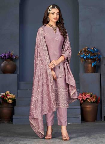 Grab These Suit in Fine Colored Pair With Bottom And Dupatta.These Top Are Dola Silk And Dupatta Are Fabricated On Nazneen Pair With Heavy Rayon Bottom.Its Beautified With Heavy Wevon Designer With Diamond Work.