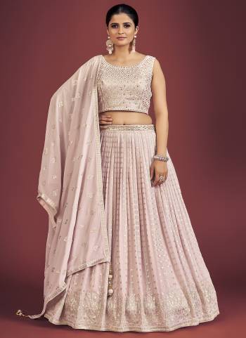 For A Designer Look,Grab These Readymade Lehenga Choli in Fine Light Colored.These Lehenga And Blouse Are Fabricated On Georgette Pair With Georgette Dupatta.Its Beautified With Designer Heavy Sequance,Mirror Embroidery Work.