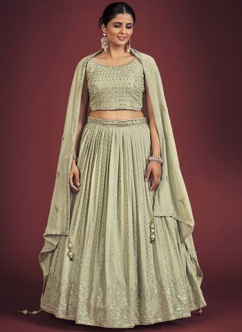 For A Designer Look,Grab These Readymade Lehenga Choli in Fine Light Colored.These Lehenga And Blouse Are Fabricated On Georgette Pair With Georgette Dupatta.Its Beautified With Designer Heavy Sequance,Mirror Embroidery Work.