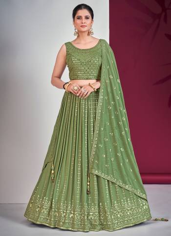 For A Designer Look,Grab These Readymade Lehenga Choli in Fine Light Colored.These Lehenga And Blouse Are Fabricated On Georgette Pair With Georgette Dupatta.Its Beautified With Designer Heavy Sequance,Mirror Embroidery Work.