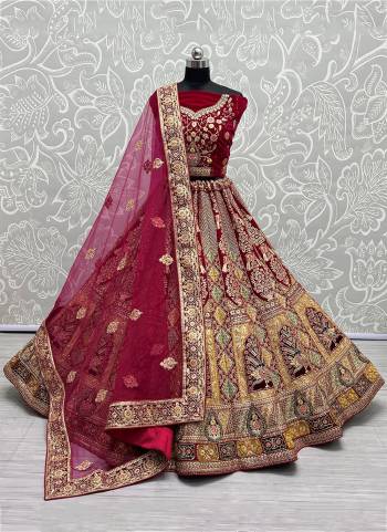 For A Designer Look,Grab These Lehenga Choli With Dupatta in Fine Colored.These Lehenga And Choli Are Velvet And Dupatta Are Fabricated On Soft Net Pair.Its Beautified With Designer Fancy Multy Thread,Dori,Jari Embroidery Work.