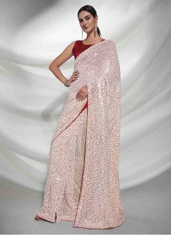 Grab These Party Wear Saree in Fine Colored.These Saree is Fabricated On Georgette Pair With Art Silk Blouse.Its Beautified With Heavy Sequance Embroidery Work.