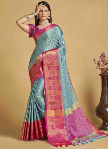 Garb This Partywear Saree Paired With Contrast Blouse.This Saree And Blouse Are Soft Silk Based Fabric With Weaving Jacquard Designer. Buy This Pretty Saree Now.