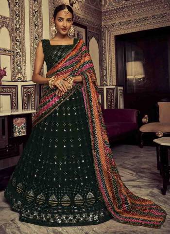 For A Designer Look,Grab These Lehenga Choli in Fine Colored.These Lehenga And Blouse Are Fabricated On Georgette Pair With Silk Dupatta.Its Beautified With Thread,Sequance Embroidery Work.