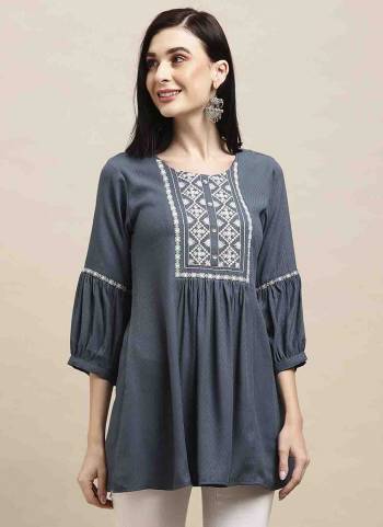 Garb These Beautiful Looking Readymade Short Kurti.These Kurtis Fabricated On Poly Rayon.Its Beautified With Designer Floral Embroidery Work.