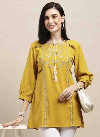 Garb These Beautiful Looking Readymade Short Kurti.These Kurtis Fabricated On Poly Rayon.Its Beautified With Designer Floral Embroidery Work.