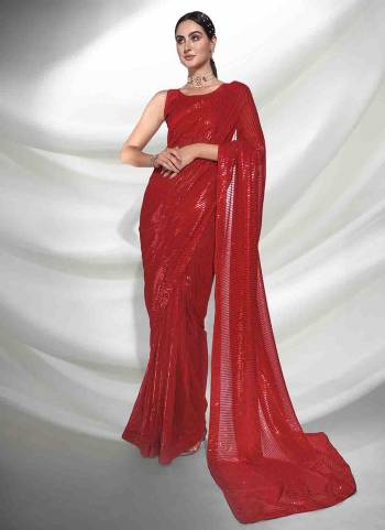 Grab These Party Wear Saree in Fine Colored.These Saree is Fabricated On Georgette Pair With Art Silk Blouse.Its Beautified With Heavy Sequance Embroidery Work.