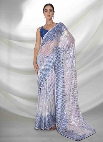 Grab These Party Wear Saree in Fine Colored.These Saree is Fabricated On Georgette Pair With Art Silk Blouse.Its Beautified With Heavy Sequance Embroidery Work.