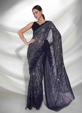 Grab These Party Wear Saree in Fine Colored.These Saree is Fabricated On Georgette Pair With Art Silk Blouse.Its Beautified With Heavy Sequance Embroidery Work.