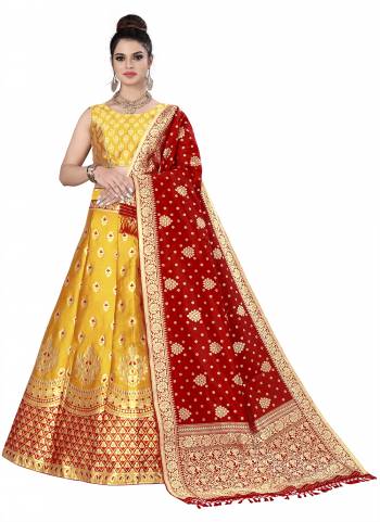 Grab These Semi Stitched Lehenga Choli in Fine Colored.These Lehenga Choli And Dupatta Are Fabricated On Banarasi Silk.Its Beautified With Heavy Wevon Jari Designer Work.