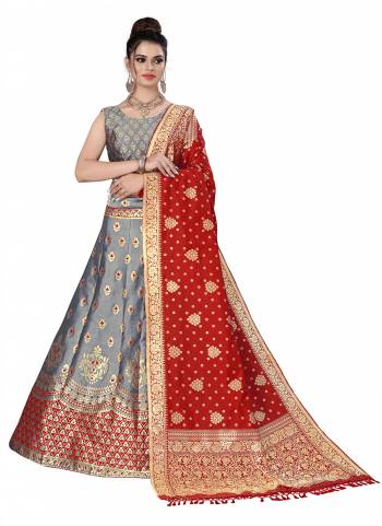 Grab These Semi Stitched Lehenga Choli in Fine Colored.These Lehenga Choli And Dupatta Are Fabricated On Banarasi Silk.Its Beautified With Heavy Wevon Jari Designer Work.