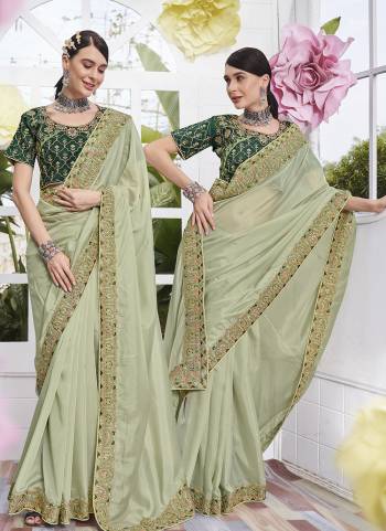 Garb These Party Wear Saree in Fine Colored.These Saree Are Satin Organza And Blouse is Fabricated On Art Silk Pair.Its Beautified With Heavy Embroidery Work.