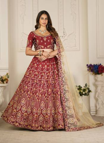 For A Designer Look,Grab These Lehenga Choli in Fine Colored.These Lehenga Choli Are Taffeta Silk And Dupatta Are Fabricated On Net Pair.Its Beautified With Fancy Designer Thread Embroidery Work.