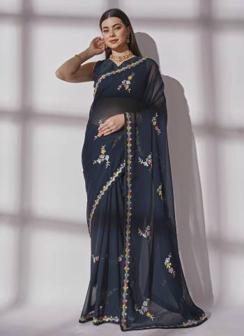 Grab These Party Wear Saree in Fine Colored.These Saree is Fabricated On Georgette Pair With Art Silk Blouse.Its Beautified With Heavy Sequance Embroidery Work.