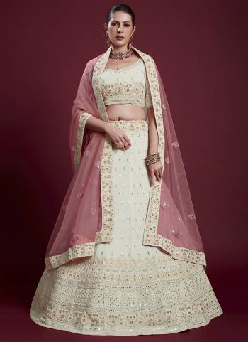 For A Designer Look,Grab These Lehenga Choli in Fine Colored.These Lehenga And Blouse Are Fabricated On Georgette Pair With Soft Net Dupatta.Its Beautified With Designer Heavy Embroidery Work.