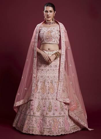 For A Designer Look,Grab These Lehenga Choli in Fine Colored.These Lehenga And Blouse Are Fabricated On Georgette Pair With Soft Net Dupatta.Its Beautified With Designer Heavy Embroidery Work.