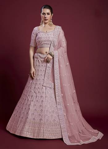 For A Designer Look,Grab These Lehenga Choli in Fine Colored.These Lehenga And Blouse Are Fabricated On Georgette Pair With Soft Net Dupatta.Its Beautified With Designer Heavy Embroidery Work.