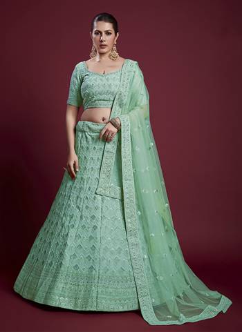 For A Designer Look,Grab These Lehenga Choli in Fine Colored.These Lehenga And Blouse Are Fabricated On Georgette Pair With Soft Net Dupatta.Its Beautified With Designer Heavy Embroidery Work.