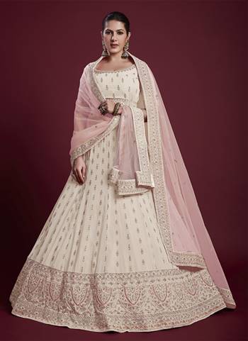 For A Designer Look,Grab These Lehenga Choli in Fine Colored.These Lehenga And Blouse Are Fabricated On Georgette Pair With Soft Net Dupatta.Its Beautified With Designer Heavy Embroidery Work.