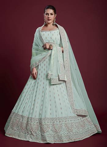 For A Designer Look,Grab These Lehenga Choli in Fine Colored.These Lehenga And Blouse Are Fabricated On Georgette Pair With Soft Net Dupatta.Its Beautified With Designer Heavy Embroidery Work.