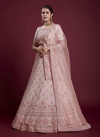 For A Designer Look,Grab These Lehenga Choli in Fine Colored.These Lehenga And Blouse Are Fabricated On Georgette Pair With Soft Net Dupatta.Its Beautified With Designer Heavy Embroidery Work.