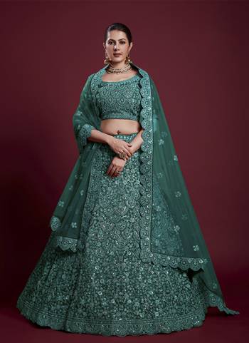 For A Designer Look,Grab These Lehenga Choli in Fine Colored.These Lehenga And Blouse Are Fabricated On Soft Net Pair With Soft Net Dupatta.Its Beautified With Designer Heavy Embroidery Work.