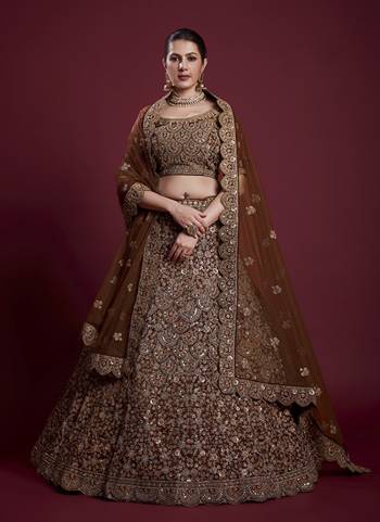 For A Designer Look,Grab These Lehenga Choli in Fine Colored.These Lehenga And Blouse Are Fabricated On Soft Net Pair With Soft Net Dupatta.Its Beautified With Designer Heavy Embroidery Work.