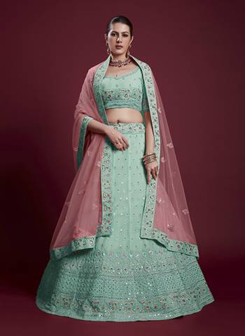 For A Designer Look,Grab These Lehenga Choli in Fine Colored.These Lehenga And Blouse Are Fabricated On Georgette Pair With Soft Net Dupatta.Its Beautified With Designer Heavy Embroidery Work.