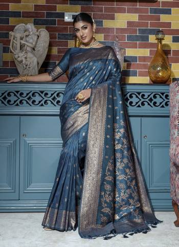 Attrective These Party Wear Saree in Fine Colored.These Saree And Blouse is Fabricated On Banarasi Raw Silk.Its Beautified With Weavon Jari Designer.