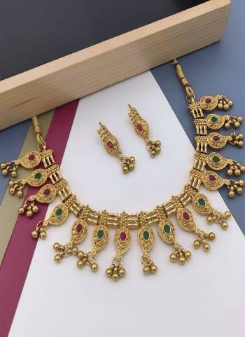 Grab These Beautifil Golden Colored Mangalsutra.These Earring is Come Mazzak Material And Beautified With Temple Work.