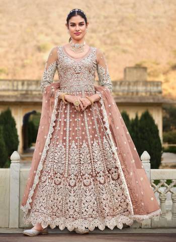 Grab These Anarkali Suit in Fine Colored Pair With Bottom And Dupatta.These Top And Dupatta Are Fabricated On Butterfly Net Pair With Crepe Bottom.Its Beautified With Heavy Designer Coding Embroidery With Stone Work.