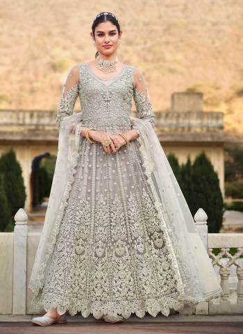 Grab These Anarkali Suit in Fine Colored Pair With Bottom And Dupatta.These Top And Dupatta Are Fabricated On Butterfly Net Pair With Crepe Bottom.Its Beautified With Heavy Designer Coding Embroidery With Stone Work.