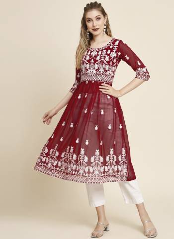 Garb These Beautiful Looking Readymade Anarkali Shape Kurti.These Kurti is Fabricated On Georgette.Its Beautified With Designer Thread Embroidery Work.