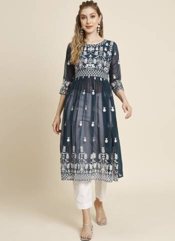 Garb These Beautiful Looking Readymade Anarkali Shape Kurti.These Kurti is Fabricated On Georgette.Its Beautified With Designer Thread Embroidery Work.